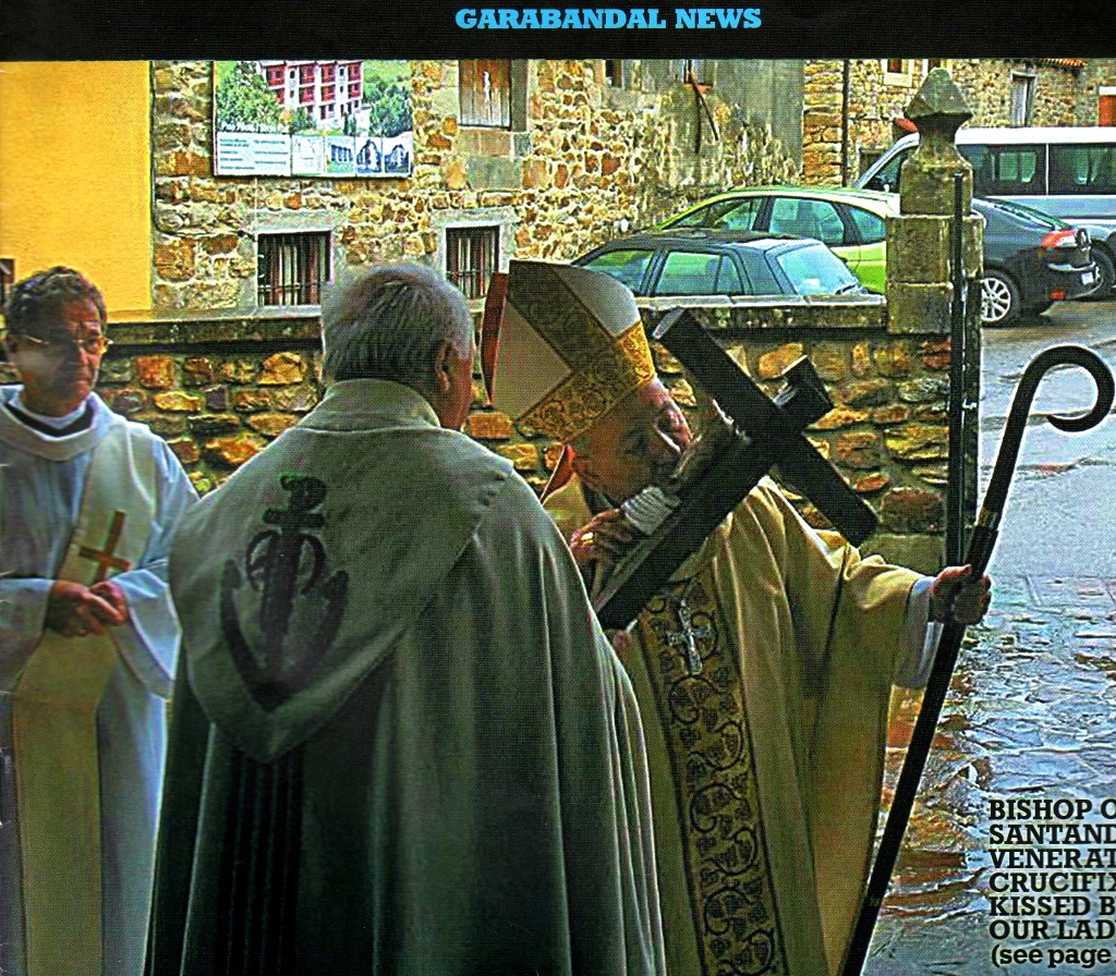 Bishop Zamora kisses Cruxifix
